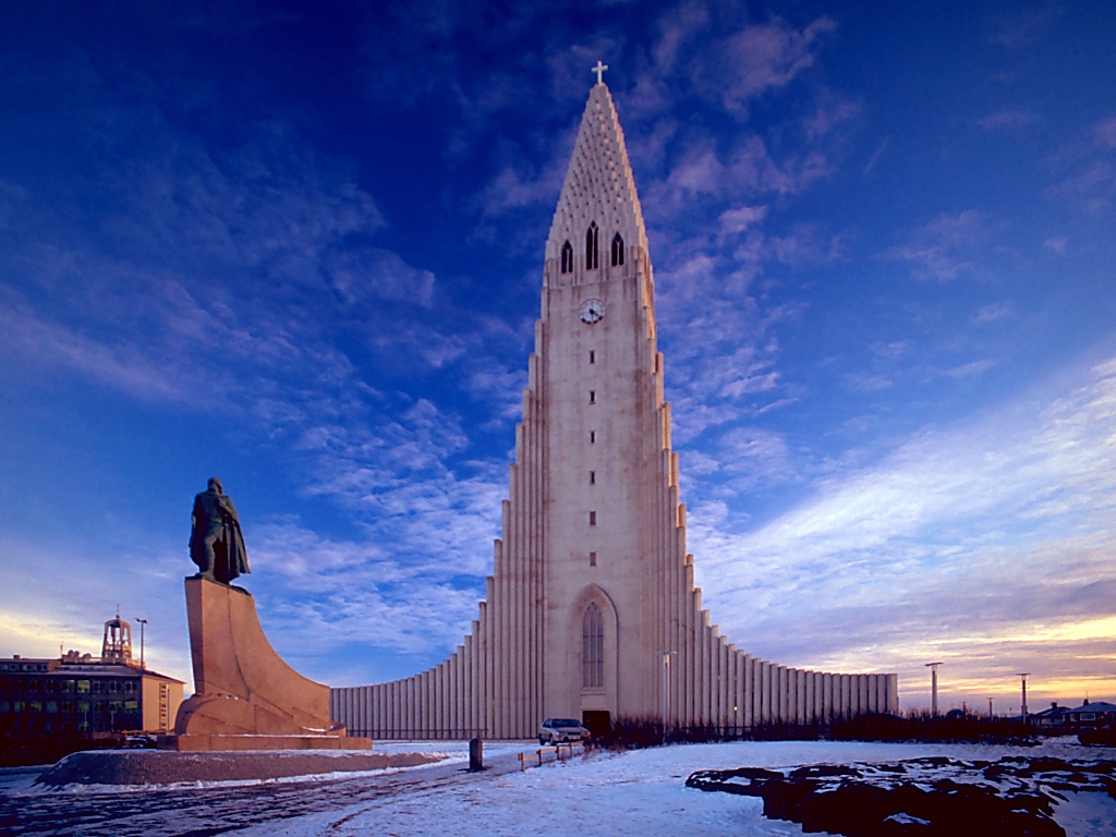 Hallgrímskirkja church rising above the rooftops of Reykjavik, Iceland